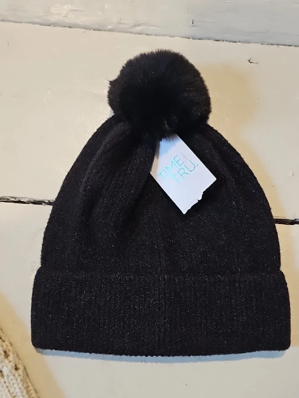 The North Face Cream Knit Slouch Hat & Time And True Black Pom Beanie
